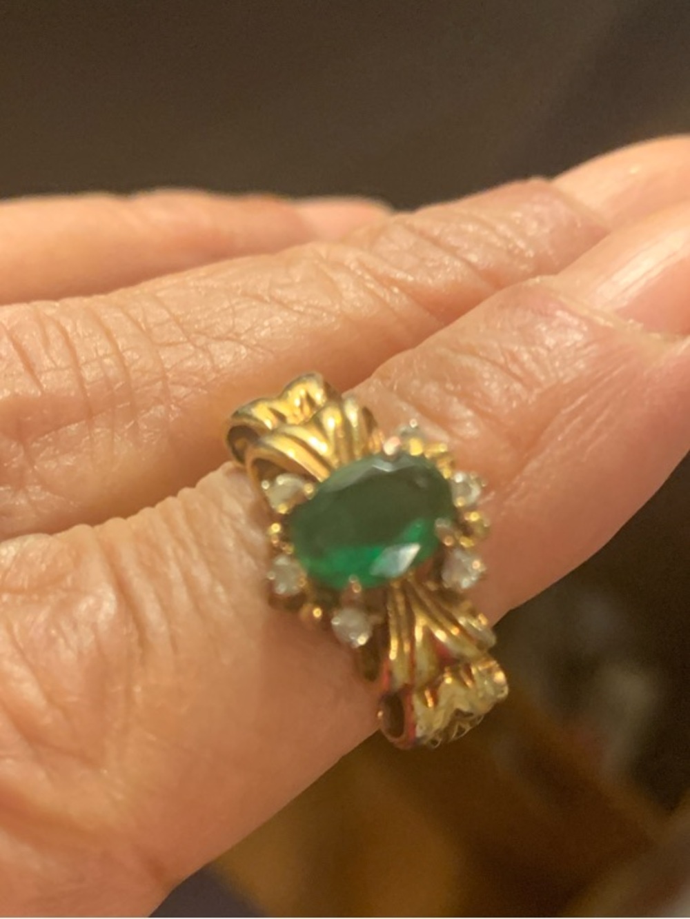 Elegant Gold-Tone Ring with Green Stone